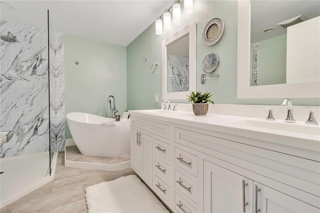 bathroom featuring vanity and separate shower and tub