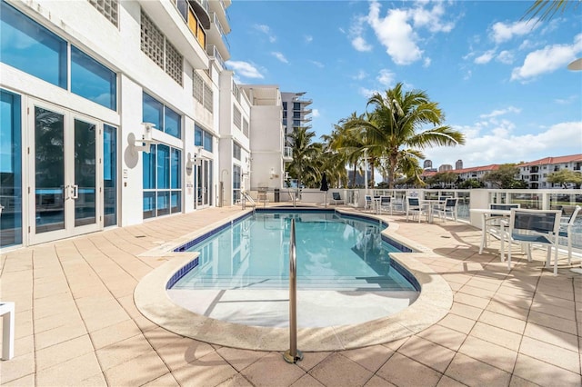 view of pool featuring a patio area