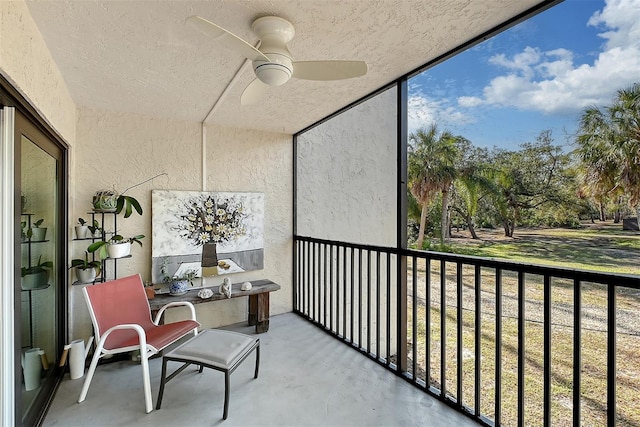 balcony featuring ceiling fan