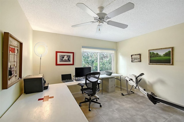 office space with ceiling fan and a textured ceiling