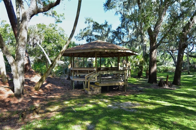 surrounding community featuring a gazebo and a yard