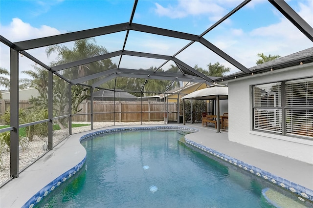 view of swimming pool with a gazebo, a lanai, and a patio area