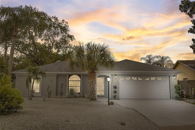 view of front of home with a garage