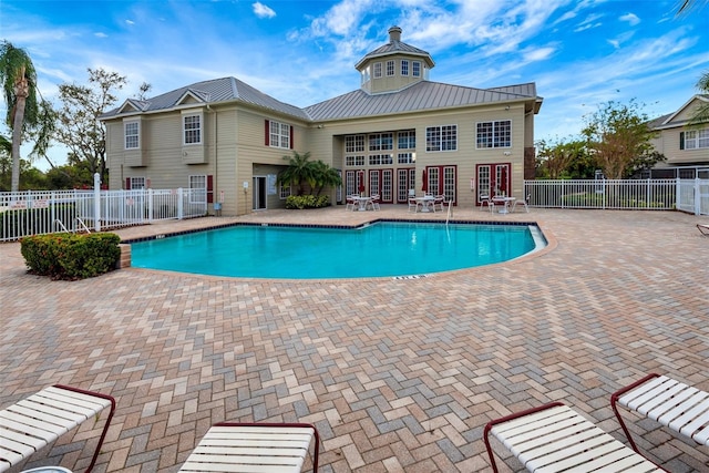 view of pool with a patio area