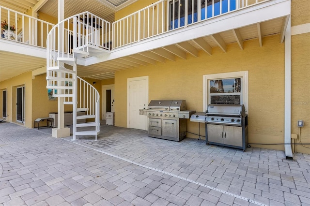 view of patio with a grill