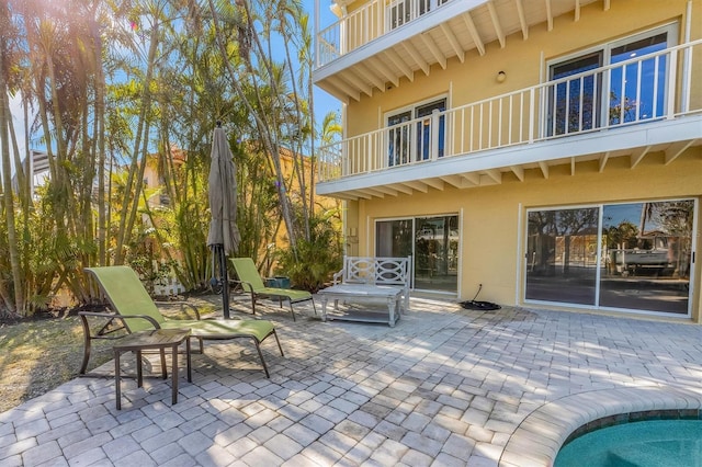 view of patio with a swimming pool