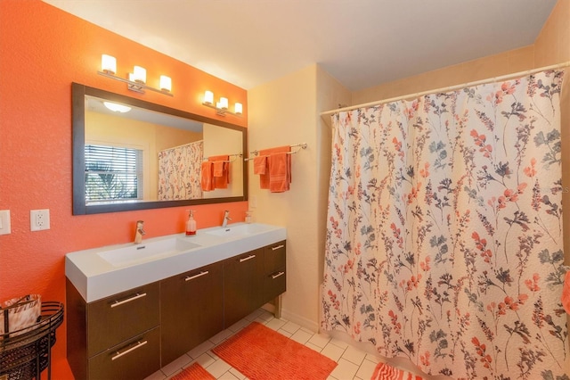 bathroom featuring tile patterned flooring, vanity, and a shower with shower curtain