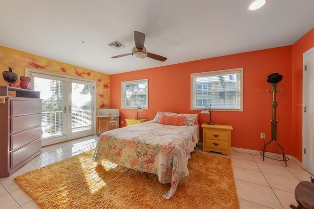 tiled bedroom with access to exterior and ceiling fan