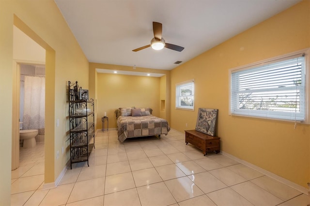 tiled bedroom with ceiling fan