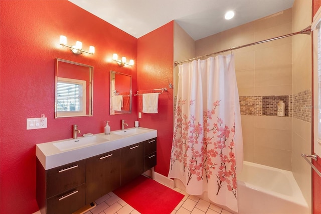 bathroom featuring vanity, tile patterned flooring, and shower / bath combo