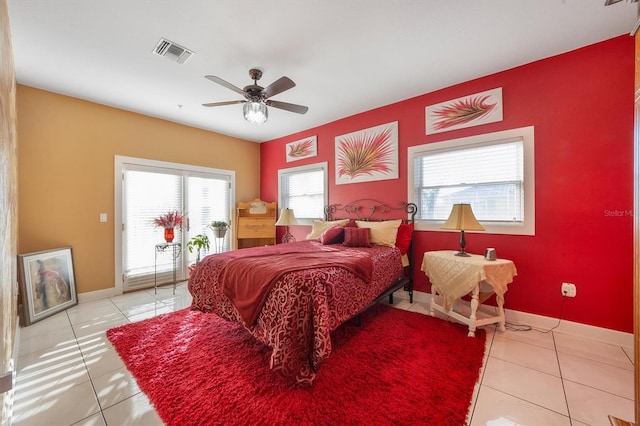 tiled bedroom with access to outside and ceiling fan