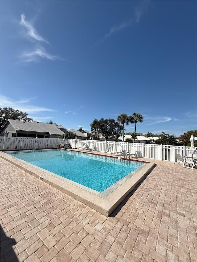 view of pool featuring a patio area