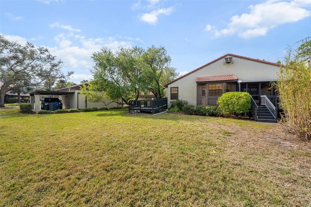 view of yard featuring a deck