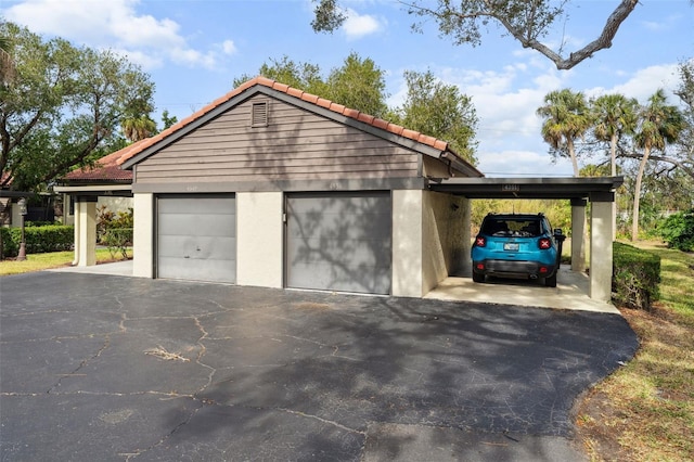 garage with a carport