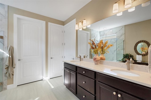 bathroom with vanity and walk in shower