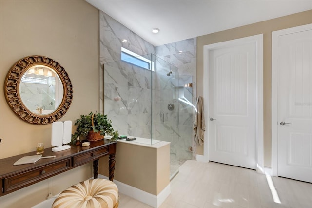 bathroom featuring a tile shower