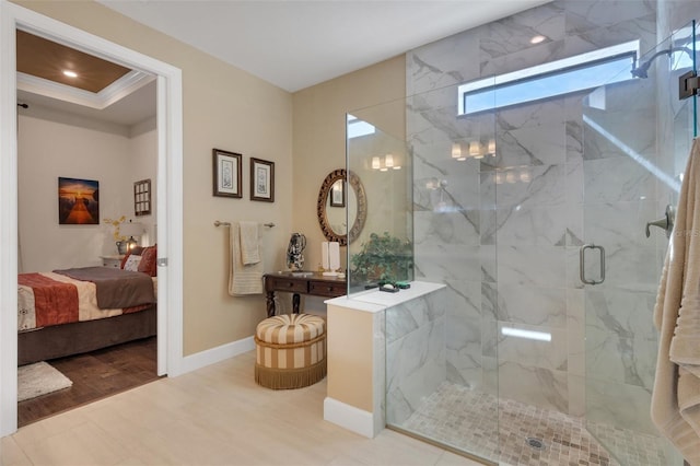 bathroom featuring crown molding, a shower with door, and hardwood / wood-style floors