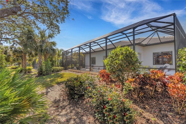 view of yard featuring a lanai