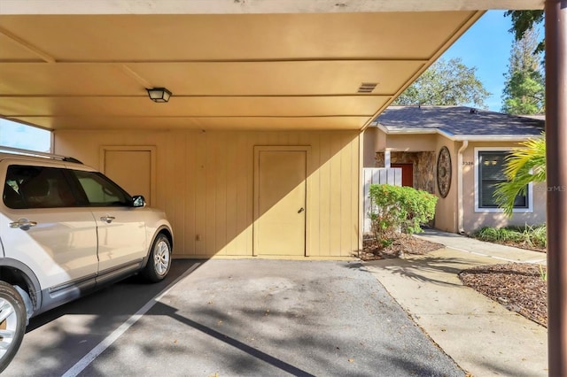 garage with a carport