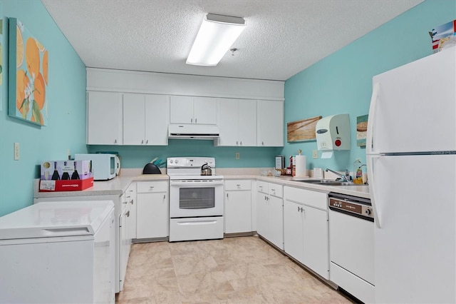 kitchen featuring white cabinetry, sink, a textured ceiling, and white appliances