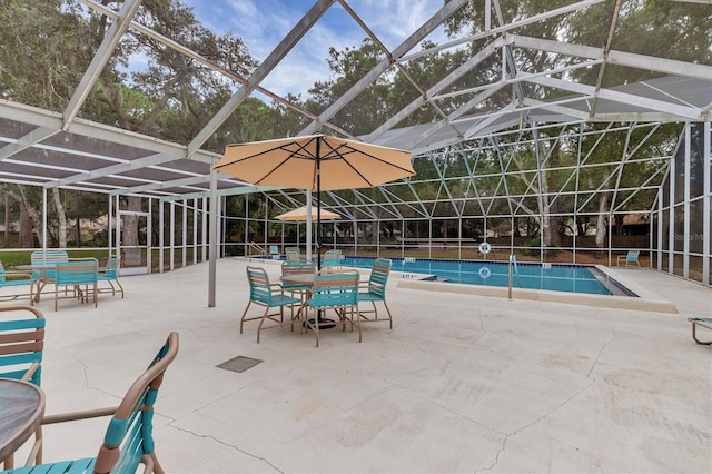 view of pool featuring a lanai and a patio area