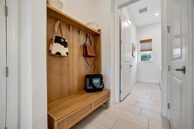 mudroom featuring light tile patterned flooring