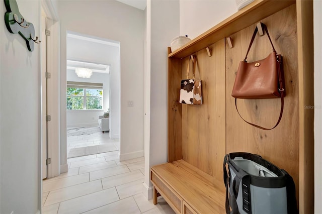 mudroom with light tile patterned floors