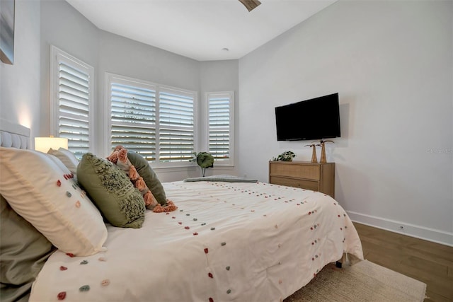 bedroom featuring dark hardwood / wood-style flooring