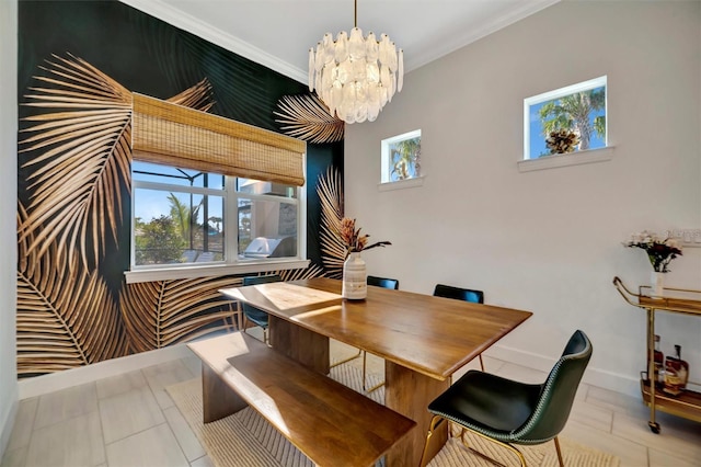 dining space with ornamental molding, plenty of natural light, and a notable chandelier