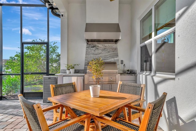 sunroom / solarium with plenty of natural light and sink