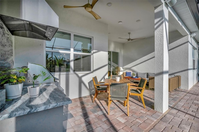 view of patio featuring ceiling fan