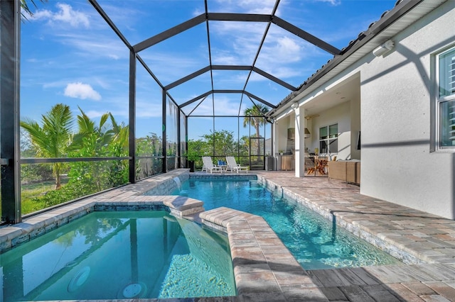 view of swimming pool with a lanai, a patio area, and exterior bar