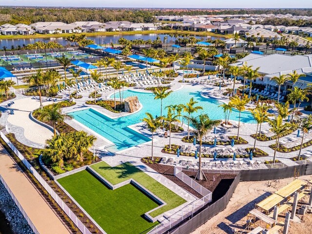 birds eye view of property featuring a water view