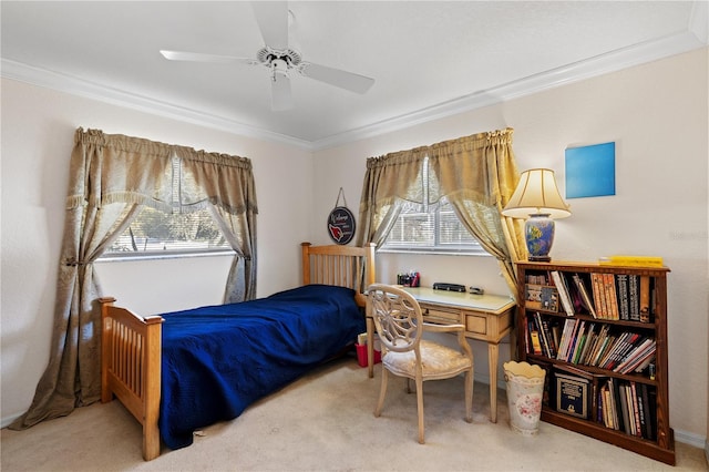 bedroom featuring ceiling fan, light colored carpet, and ornamental molding