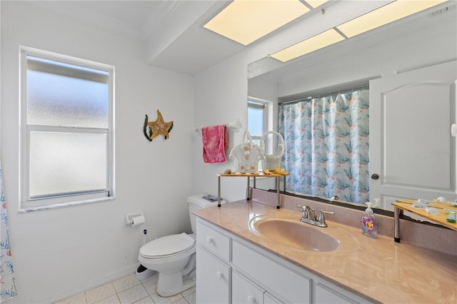 bathroom with vanity, tile patterned floors, and toilet