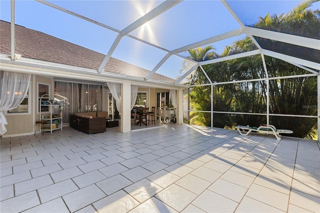 view of patio / terrace with a lanai