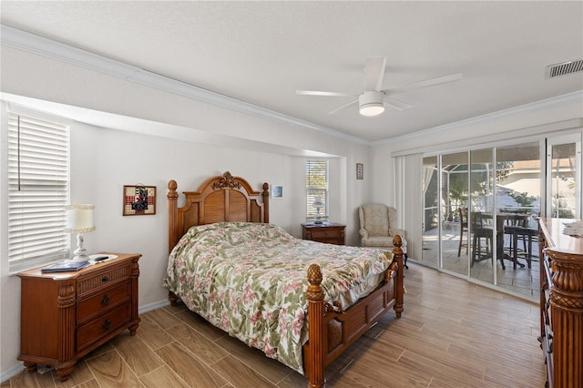 bedroom with ceiling fan, ornamental molding, and access to exterior