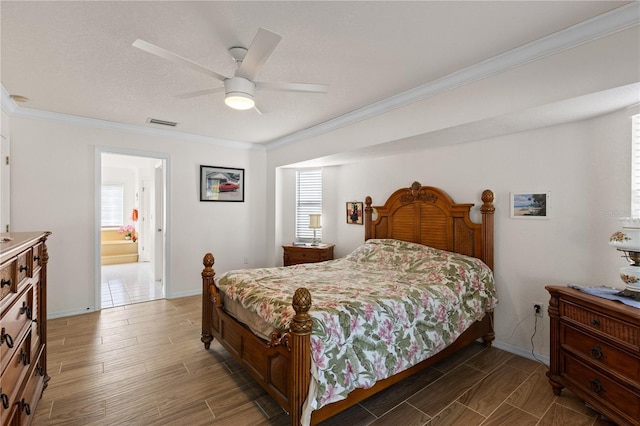 bedroom featuring ornamental molding and ceiling fan