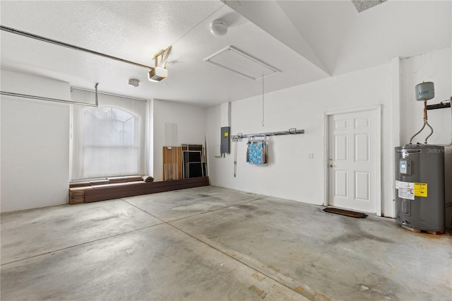 garage with a garage door opener, electric panel, and electric water heater