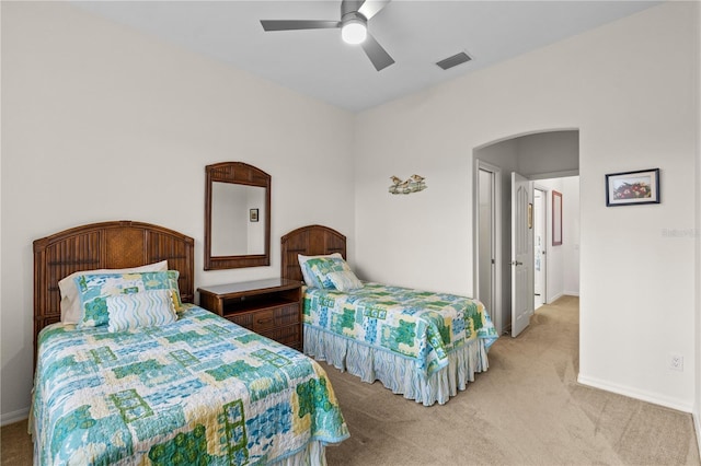 carpeted bedroom featuring ceiling fan