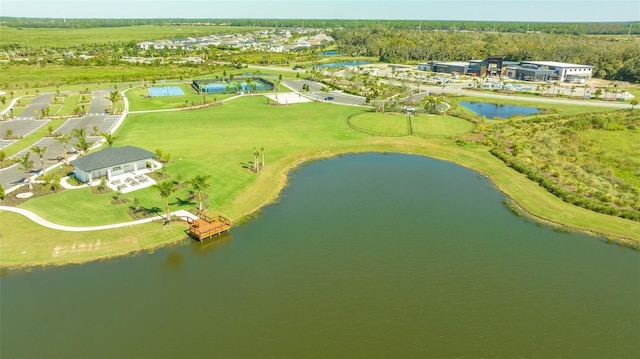 drone / aerial view with a water view