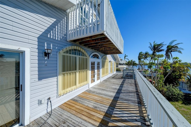 wooden deck featuring french doors