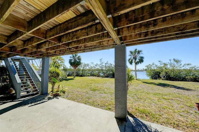 view of patio / terrace with a water view