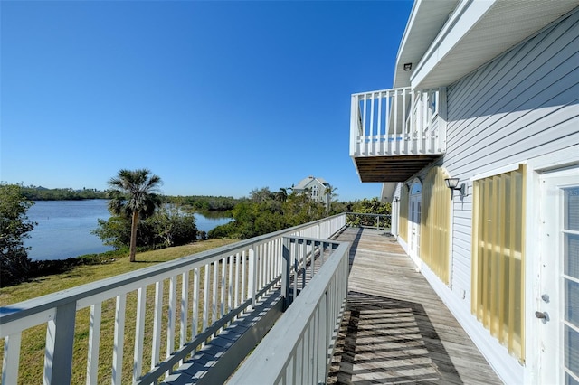 balcony with a deck with water view