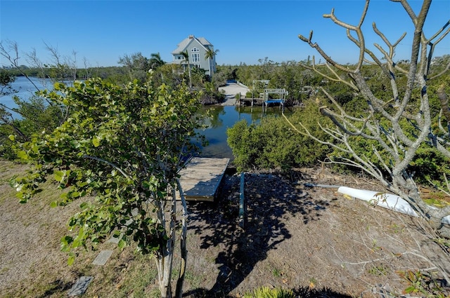 view of dock with a water view