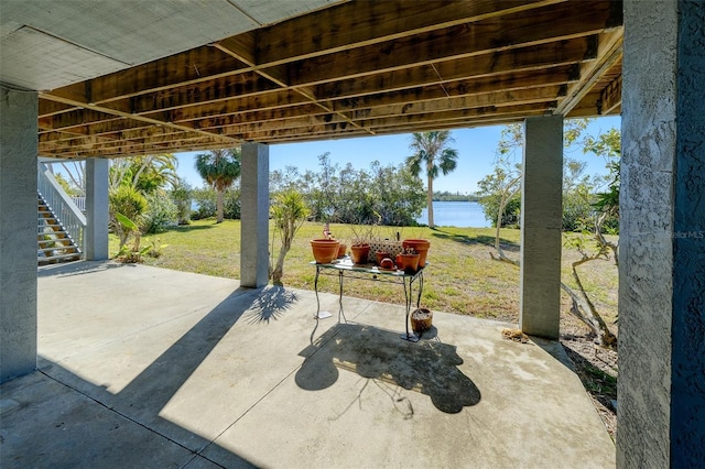 view of patio / terrace with a water view