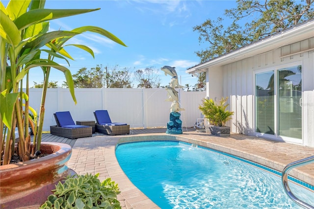 view of pool with a patio area