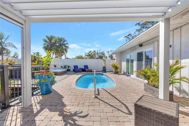 view of pool featuring an outdoor hot tub, a pergola, a patio, and pool water feature