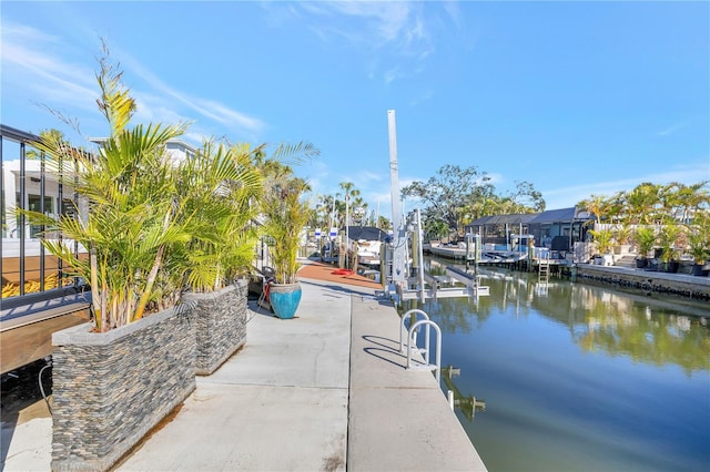 dock area with a water view