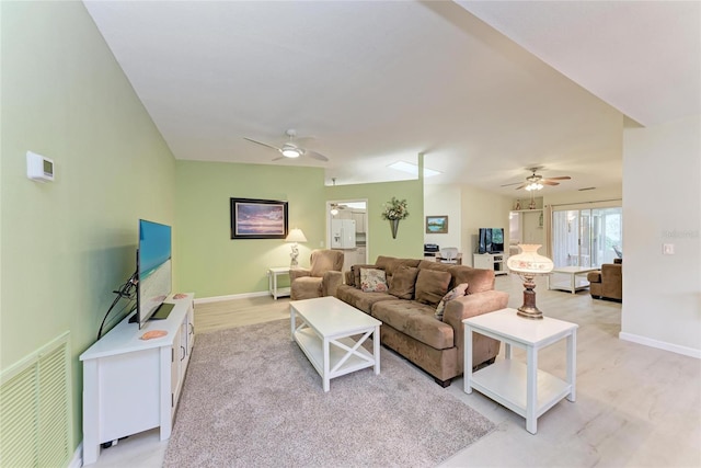 living room featuring ceiling fan